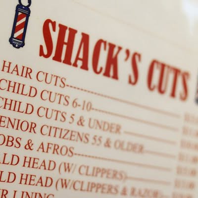 Shack's Cuts price menu listing hair cuts, child cuts, and senior cuts